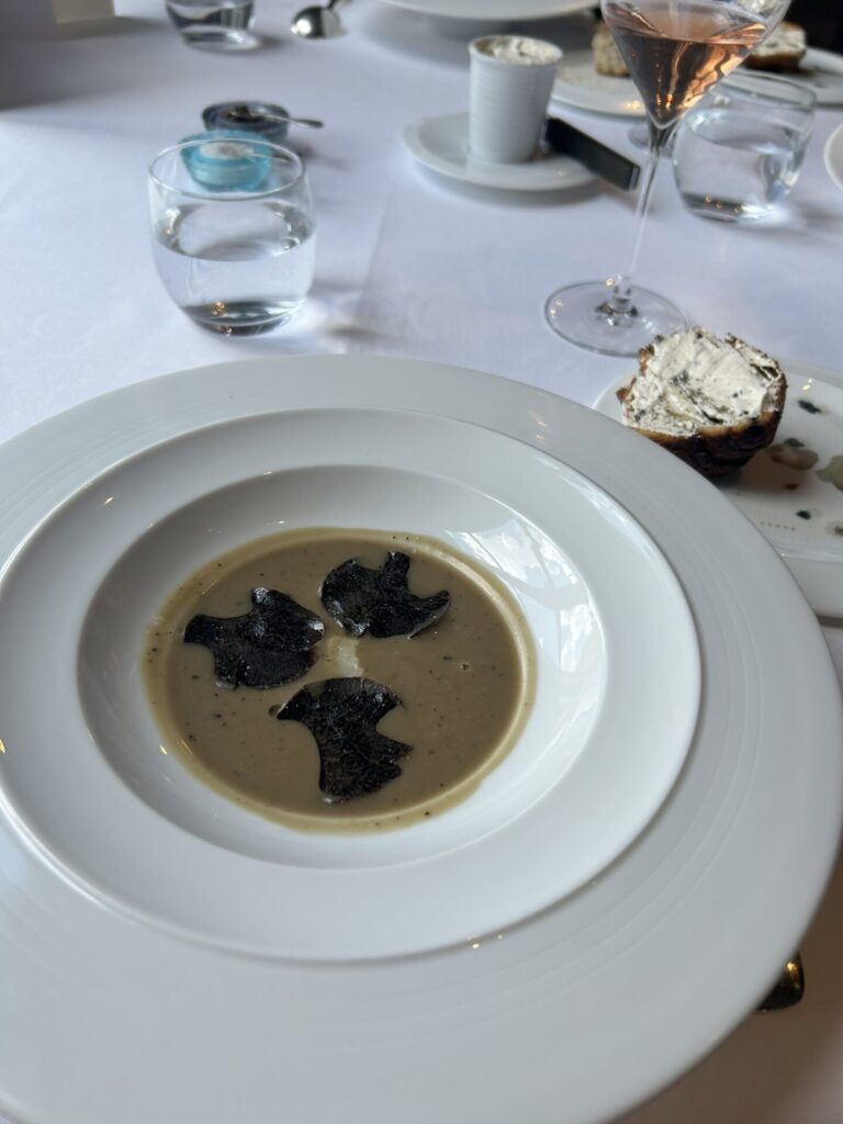 看板メニューArtichoke soup with black truffle, layered truffle mushroom brioche①